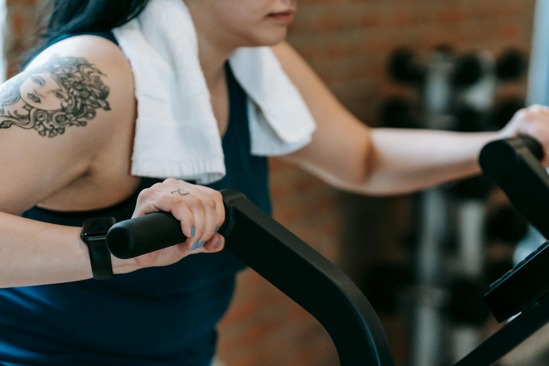 woman working out on the elliptical