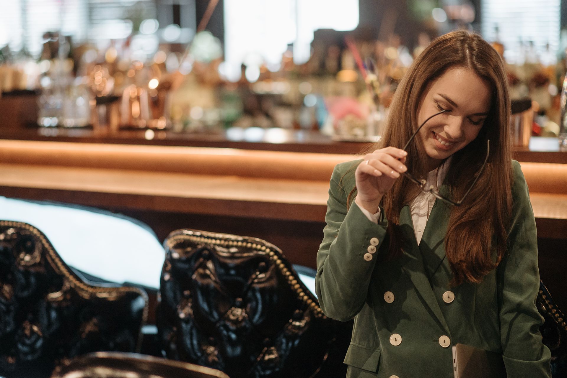 confident woman at a bar