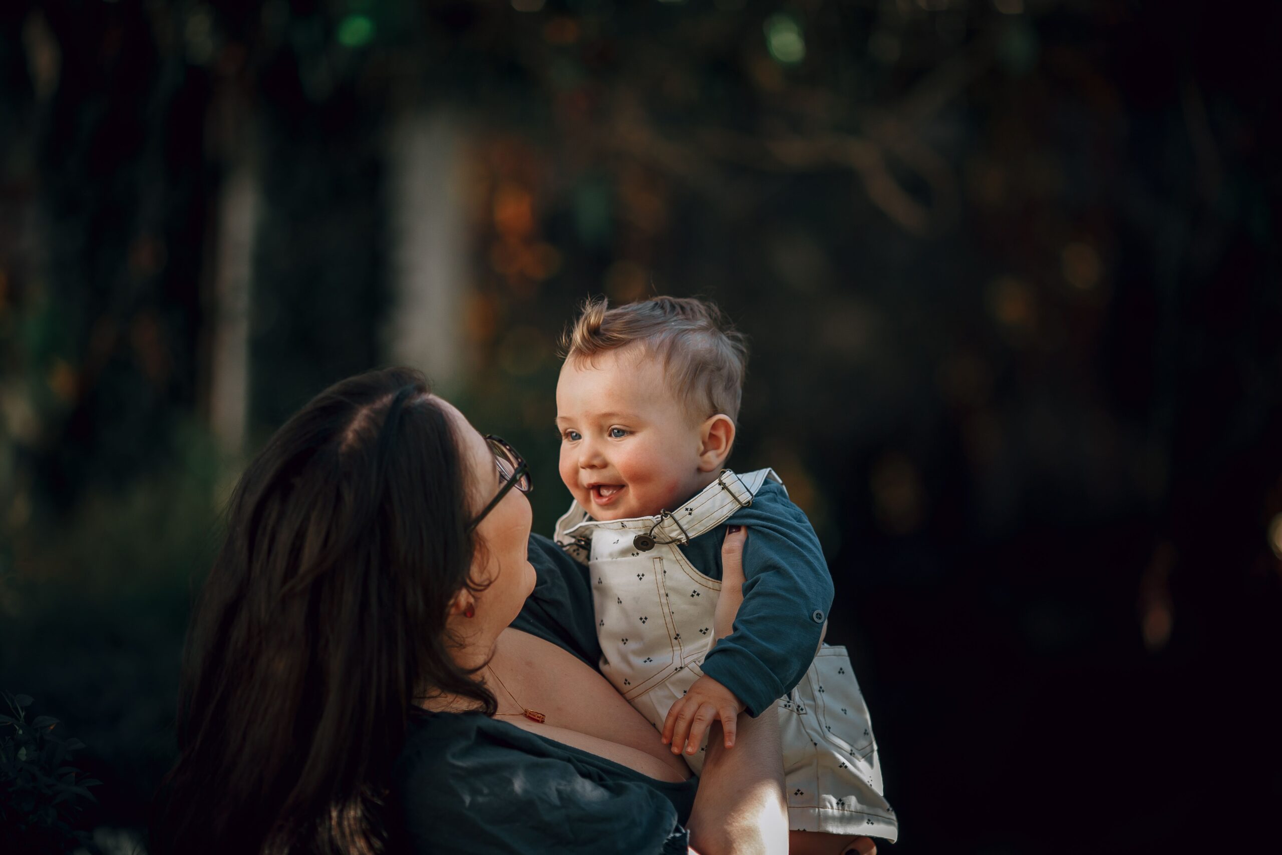 mom holding baby