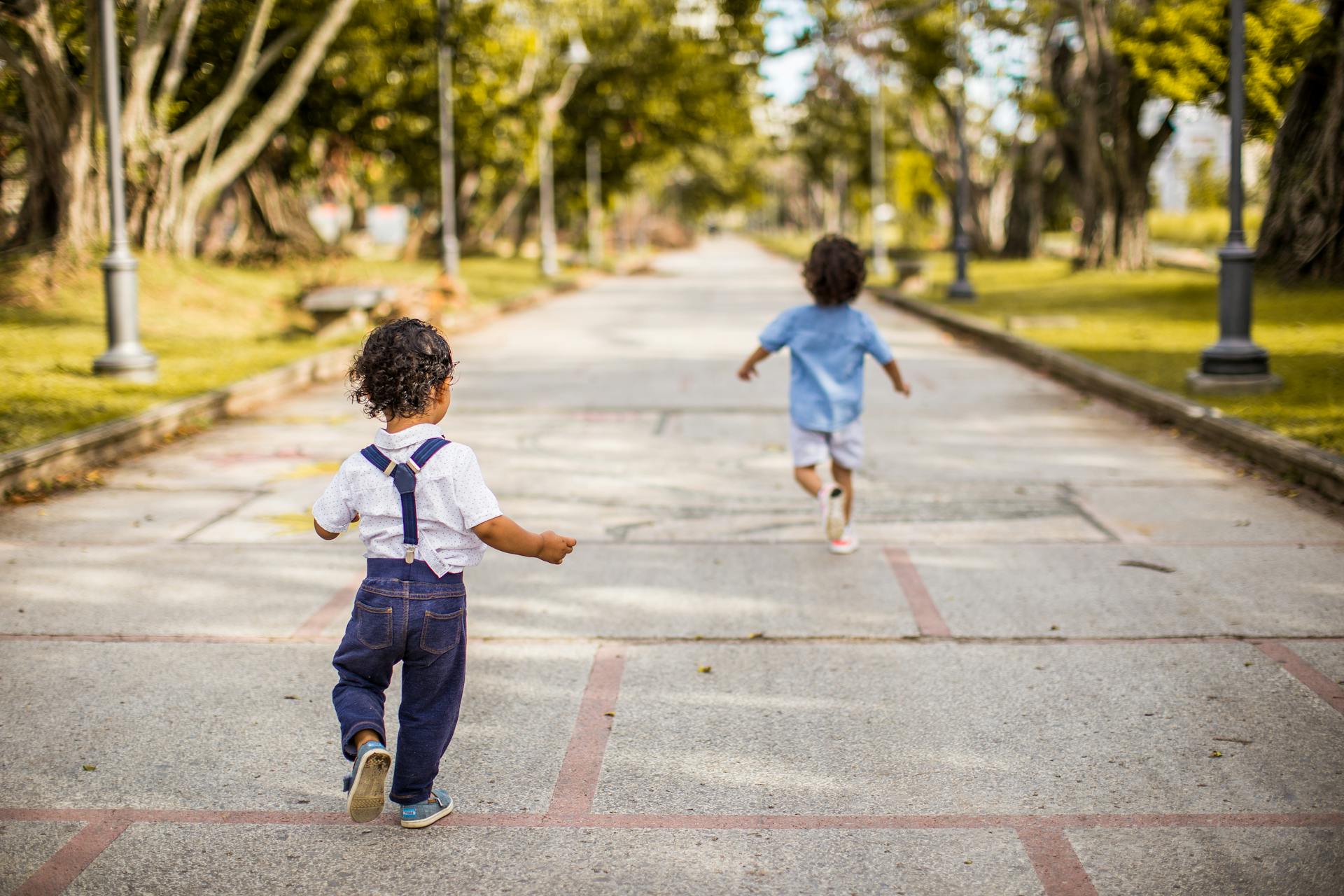 two toddlers running