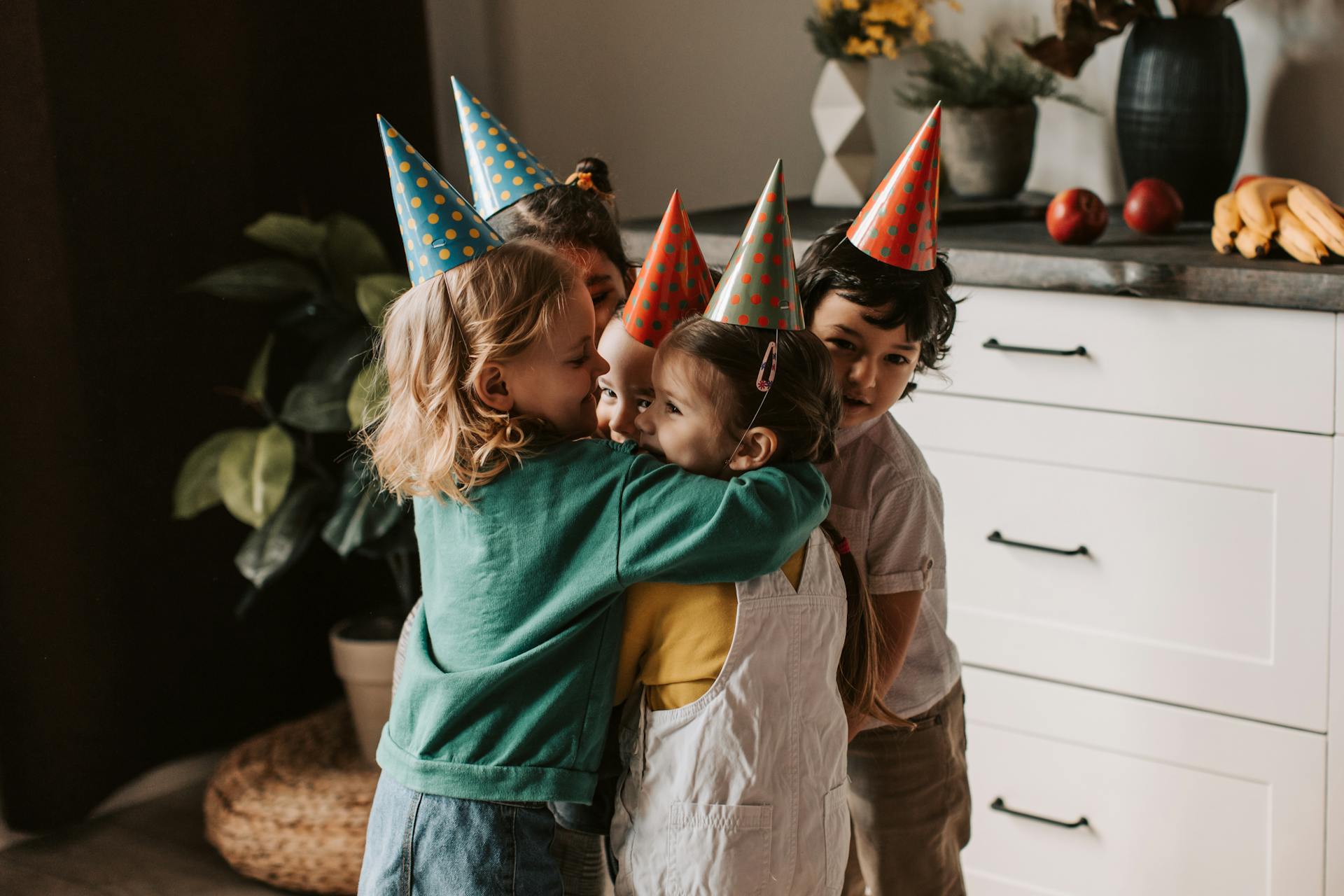 kids hugging at a birthday party