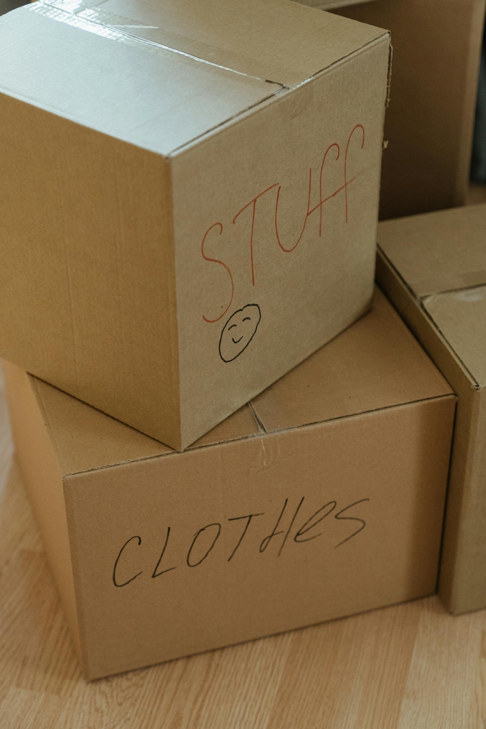 brown cardboard moving boxes labeled