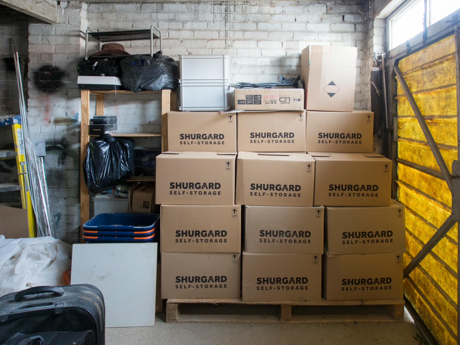 stacked boxes in a garage