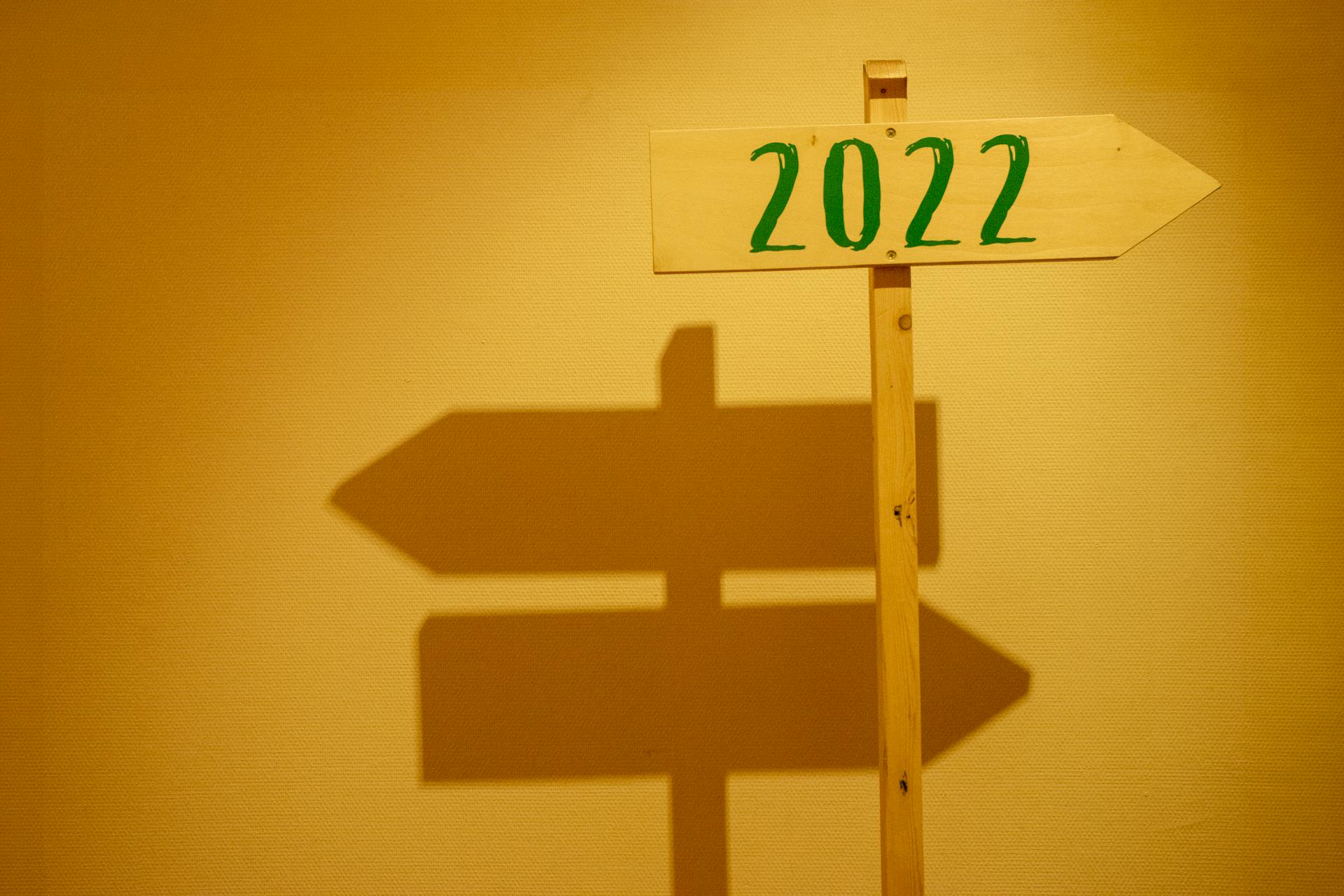 yellow sign reading 2022