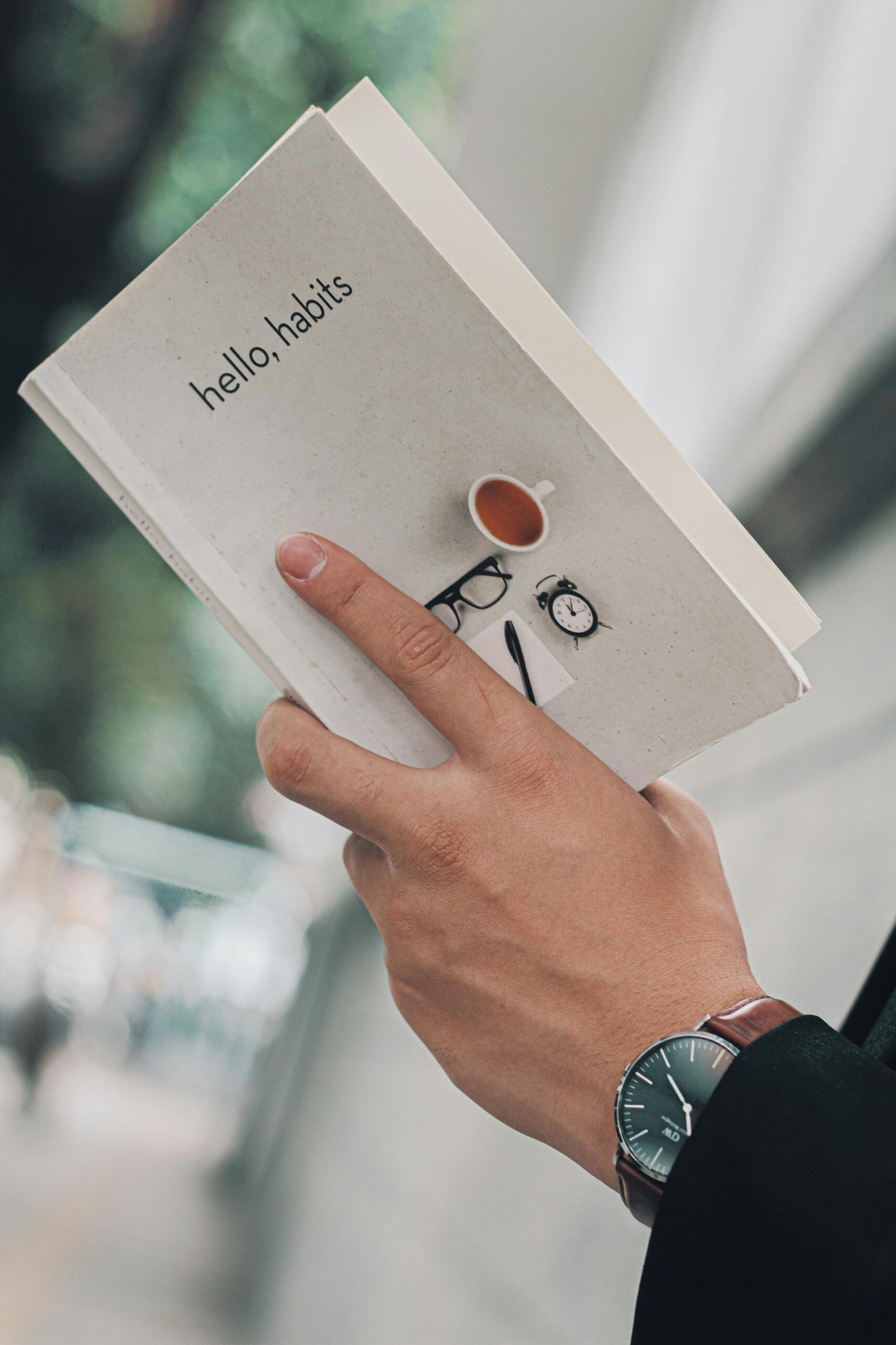 hand holding a book