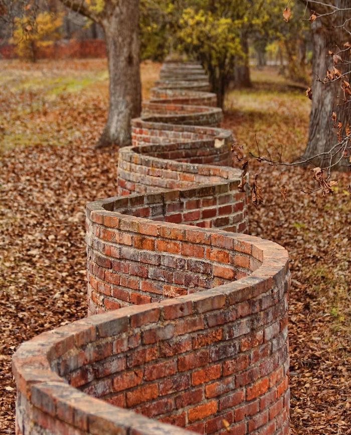 S shaped brick walls can teach us about what our environment says about our values